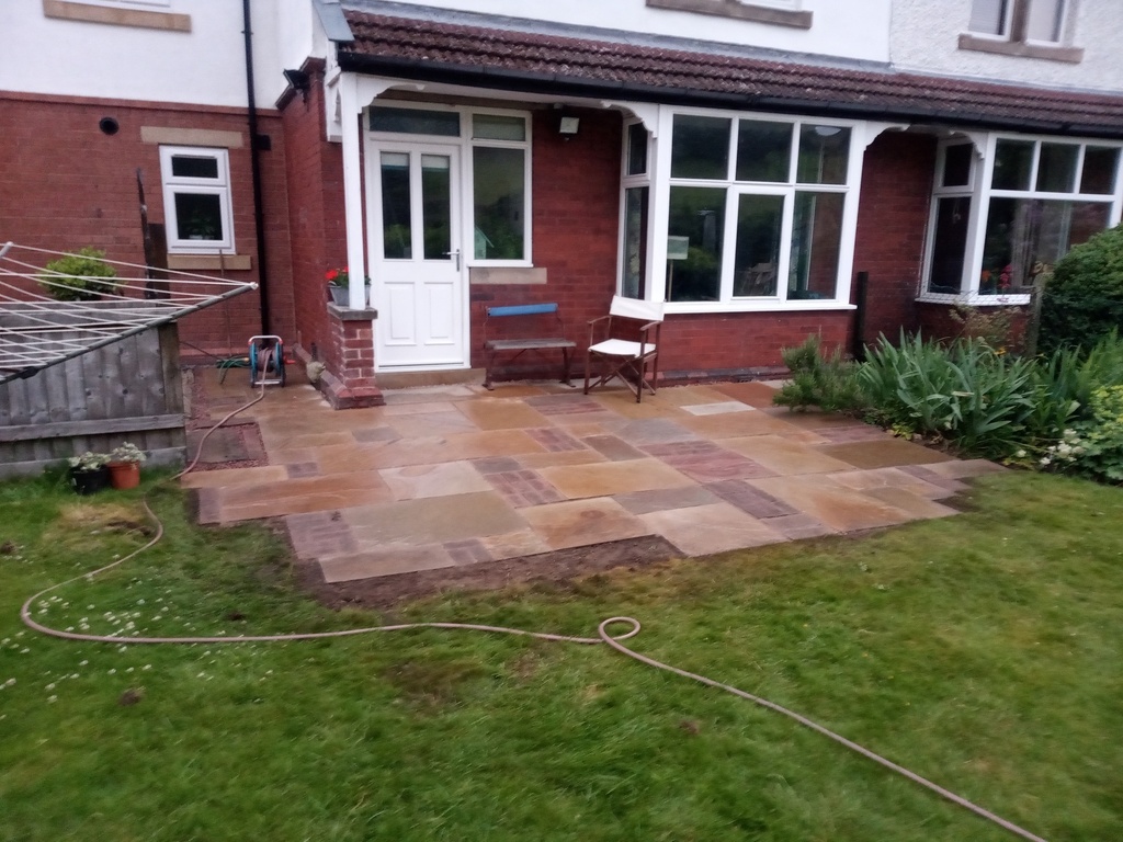 Sahara (Mix) Stone  - sloped to Lawn Patio